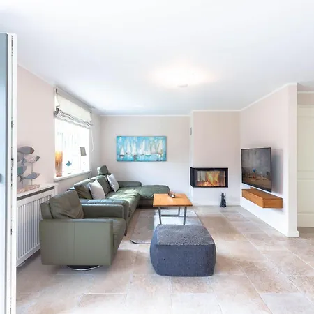 Hues Holm Ferienhaus *